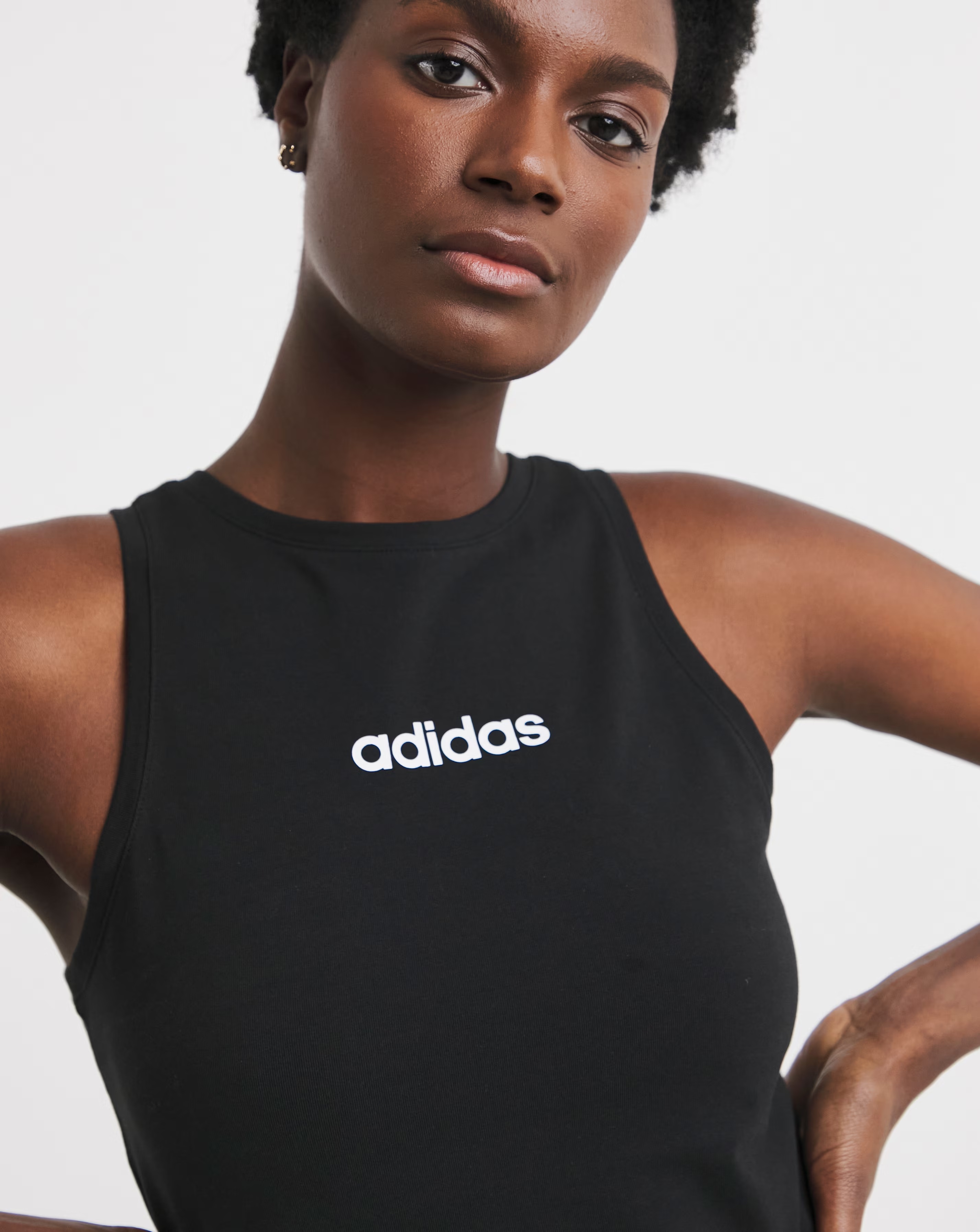 adidas Essentials Linear Slim Tank 1 adidas Essentials Linear Slim Tank